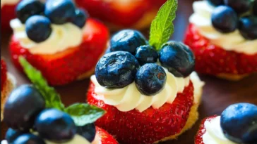 Delicious Red, White, and Blue Cheesecake Strawberries