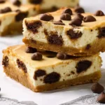 Chocolate Chip Cheesecake Bars On A Plate
