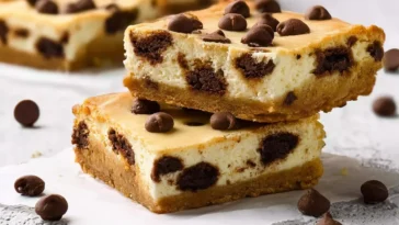 Chocolate Chip Cheesecake Bars On A Plate