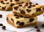 Chocolate Chip Cheesecake Bars On A Plate