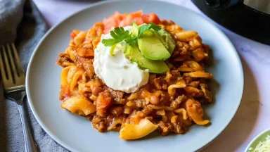 Easy Slow Cooker Taco Pasta Served in a Bowl