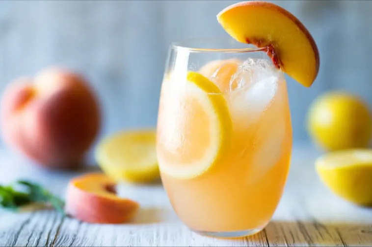 Ginger Peach Lemonade: Refreshing Summer Delight 3 Ginger Peach Lemonade in a Glass with Fresh Fruits