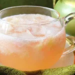 Grandma’s Peach Punch: A Delightful Summer Treat 15 Grandma’s Peach Punch in a Glass with Fresh Peaches