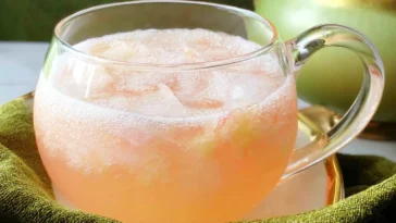 Grandma’s Peach Punch in a Glass with Fresh Peaches