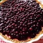Irresistible Huckleberry Cheesecake Pie Ready to Serve