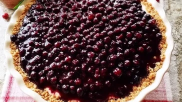Irresistible Huckleberry Cheesecake Pie Ready to Serve
