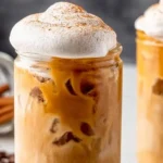 Iced Pumpkin Spice Latte: Your Fall Favorite Reimagined 5 Iced Pumpkin Spice Latte with Whipped Cream and Cinnamon