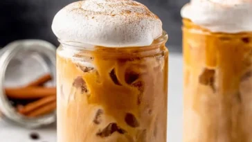 Iced Pumpkin Spice Latte with Whipped Cream and Cinnamon