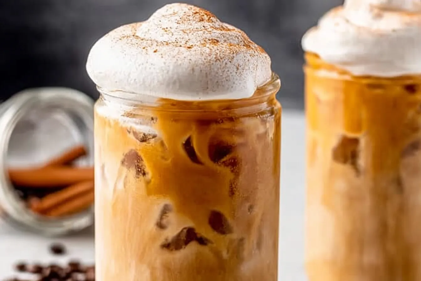 Iced Pumpkin Spice Latte with Whipped Cream and Cinnamon