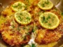 Lemon Chicken with Garlic Butter Sauce on Dinner Plate