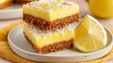 Zesty Lemon Icebox Bars on a White Plate