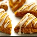 Pumpkin Scones: Delightful Fall Treats You Can't Miss 15 Pumpkin Scones Freshly Baked with Spices and Cream