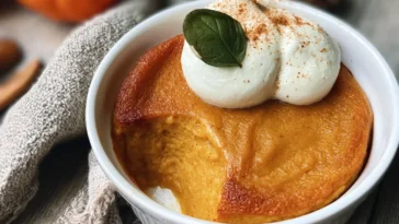 Delicious Baked Pumpkin Pudding with Whipped Cream