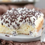 Cannoli Poke Cake: A Sweet Twist on a Classic Treat 5 Delicious Cannoli Poke Cake Slices Ready to Enjoy