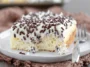 Delicious Cannoli Poke Cake Slices Ready to Enjoy