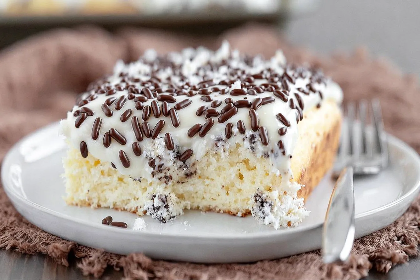 Cannoli Poke Cake: A Sweet Twist on a Classic Treat 3 Delicious Cannoli Poke Cake Slices Ready to Enjoy