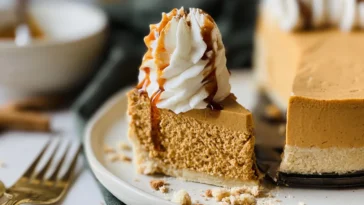 Creamy No Bake Pumpkin Cheesecake on a Dessert Table