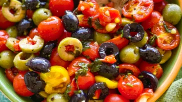 Fresh Cherry Tomato Salad with Olives in a Bowl