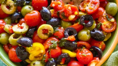 Fresh Cherry Tomato Salad with Olives in a Bowl