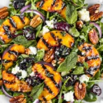 Grilled Peach Salad: A Delicious Summer Delight 5 Grilled Peach Salad on a Rustic Plate