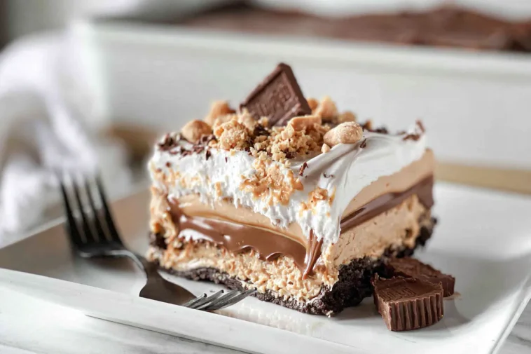Peanut Butter Lasagna: A Deliciously Decadent Dessert 3 Peanut Butter Lasagna Slice on a White Plate