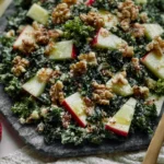 Simple Kale Apple Walnut Salad Plated with Fresh Ingredients