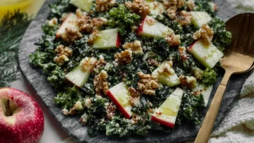 Simple Kale Apple Walnut Salad Plated with Fresh Ingredients