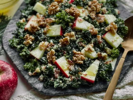 Simple Kale Apple Walnut Salad Plated with Fresh Ingredients
