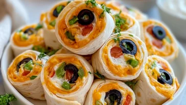 Delicious Taco Cream Cheese Pinwheels Ready to Serve