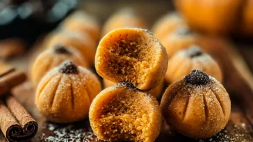 The Best No-Bake Pumpkin Cheesecake Truffles on a Plate