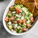 Avocado Feta Dip: A Creamy Delight You Can't Resist! 14 Creamy Avocado Feta Dip in a Bowl