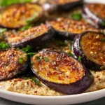 Baba Ghanoush: The Irresistible Dip You’ll Love 5 Baba Ghanoush Served in a Bowl with Olive Oil Drizzle