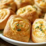 Golden Chicken Cream Cheese Crescent Rolls on a Plate