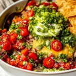 Fresh & Healthy 7-Layer Dip: A Guilt-Free Delight 5 Fresh & Healthy 7-Layer Dip in a Colorful Serving Dish