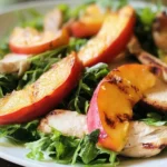 Grilled Chicken, Peach, and Arugula Salad Plated