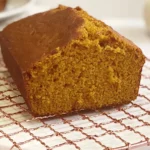 Pumpkin Bread- Rich and Buttery Delight You’ll Love! 15 Pumpkin Bread Slices on a Wooden Board