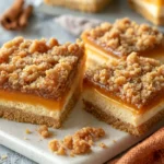 Pumpkin Caramel Cheesecake Bars with a Streusel Topping Recipe 15 Pumpkin Caramel Cheesecake Bars with Streusel in a Fall Setting