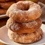 Cozy Cinnamon Sugar Apple Fritters on a Wooden Table